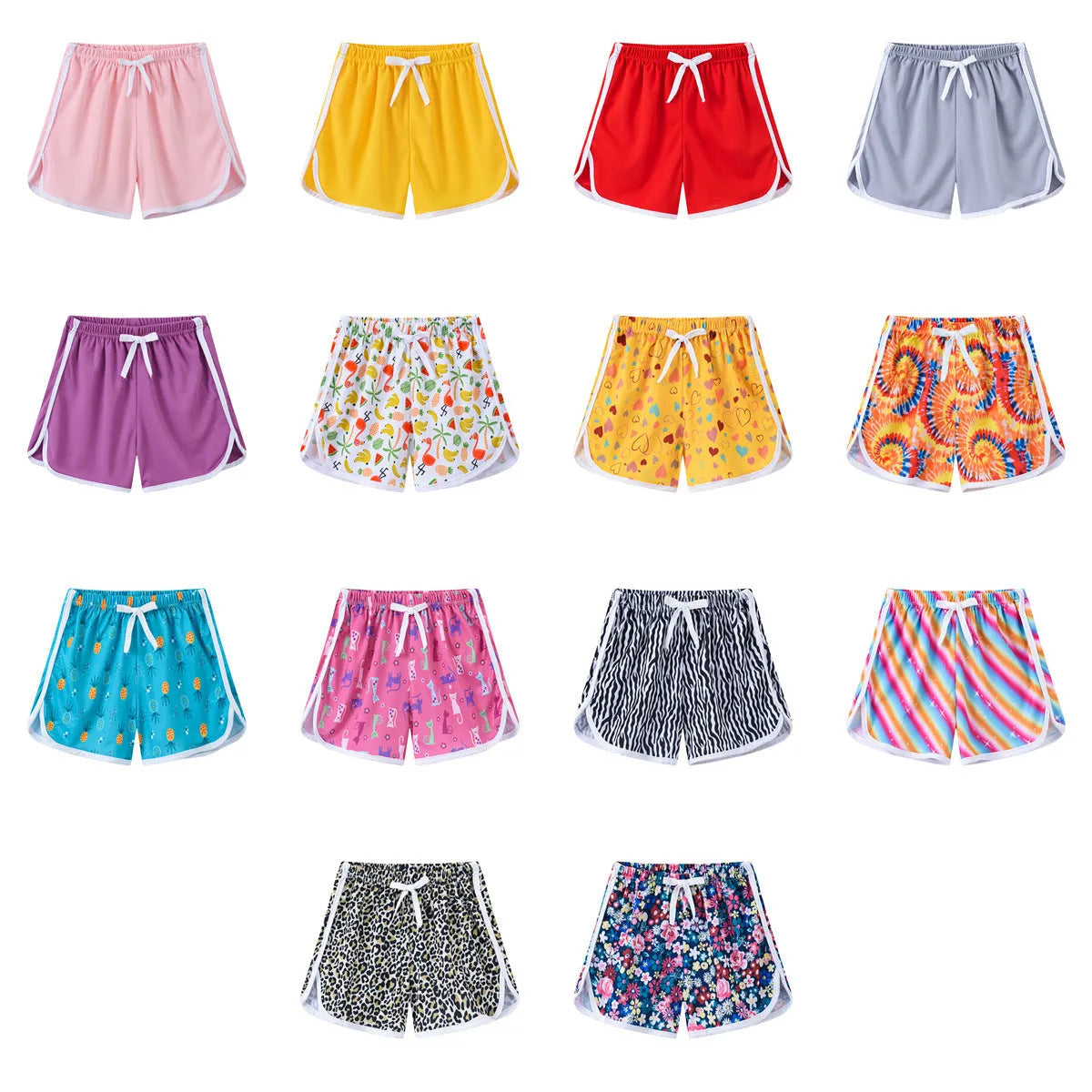 Children's patterned polyester shorts in various colours and prints for beach wear.