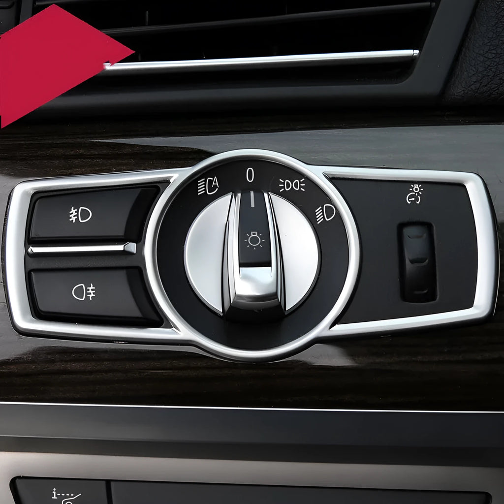 Silver ABS plastic interior sticker for BMW headlight switch frame on 5 Series, 7 Series, X3, and X4 models