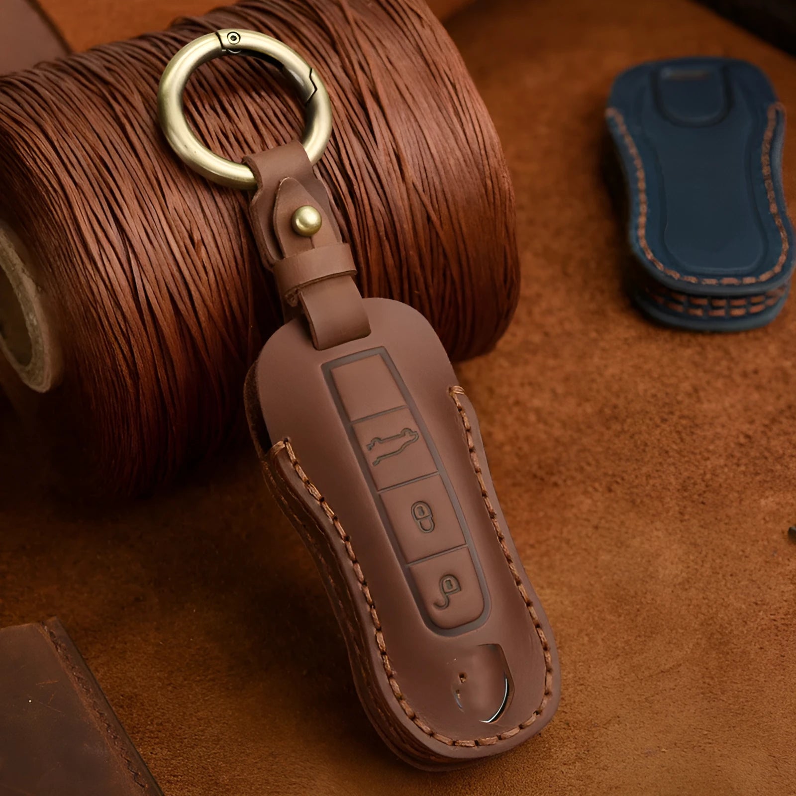 Authentic leather Porsche key cover with retro buckle in blue or brown colour
