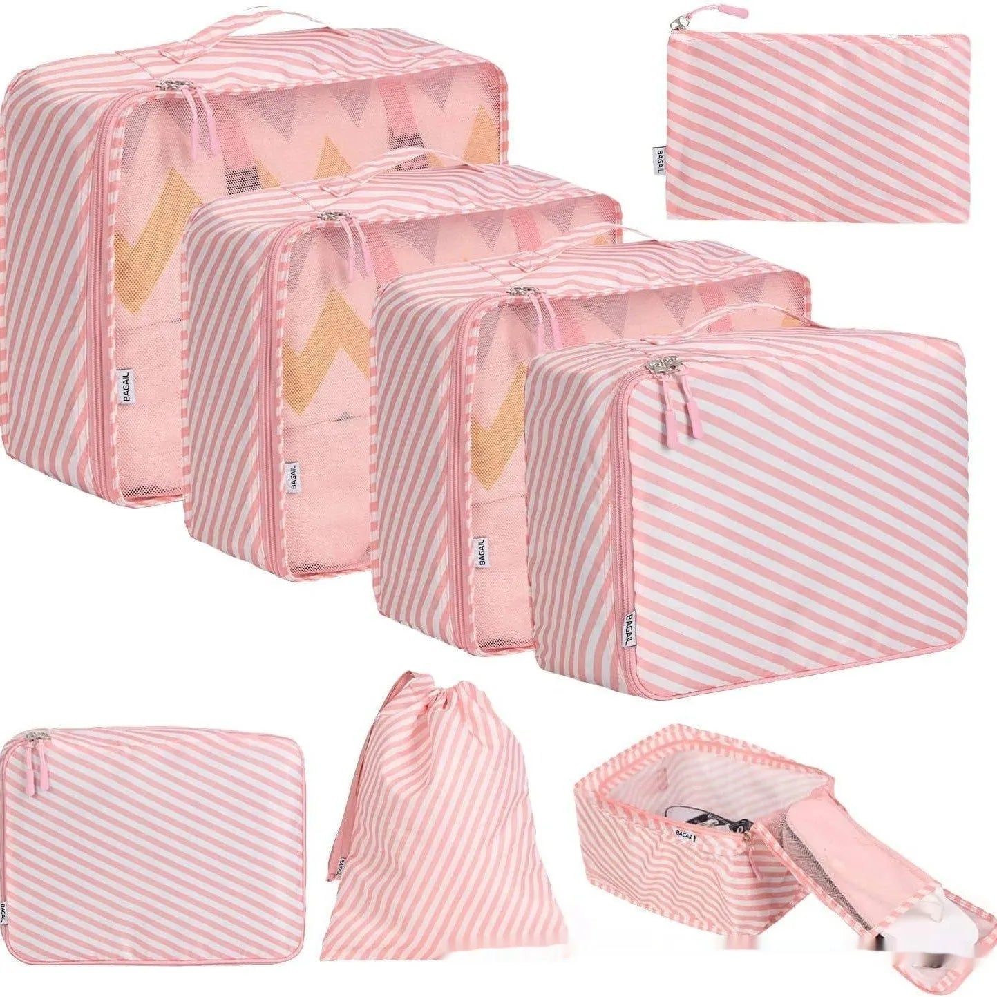 Set of eight cubic packing cubes for travel organisation in various colours including beige, black, and pink leopard print.