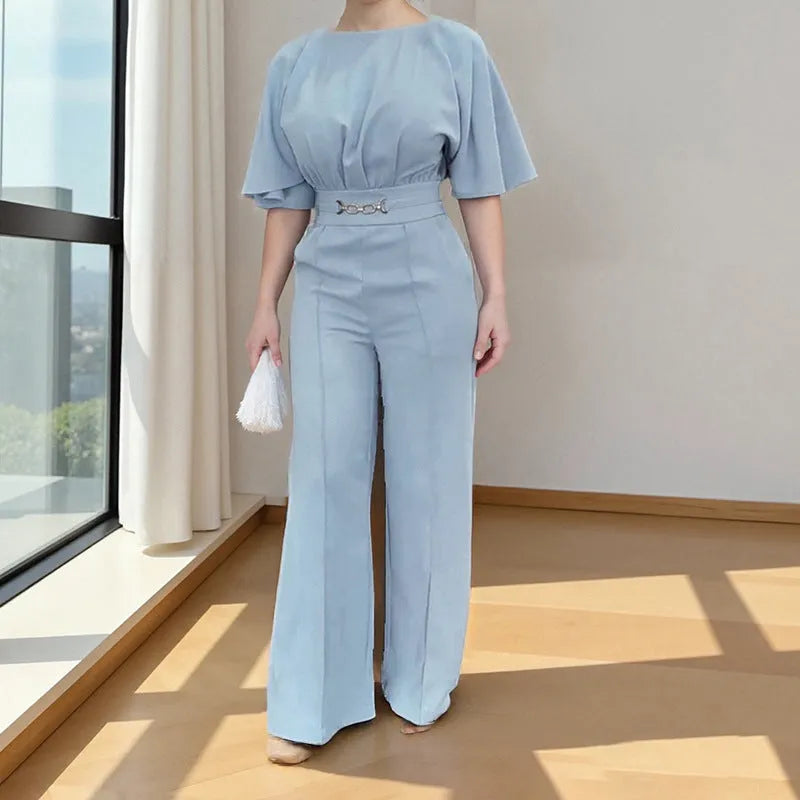 Blue men's two-piece polyester suit with long sleeves and trousers on a hanger