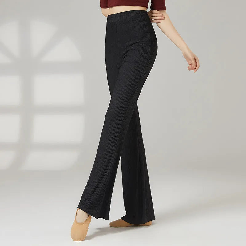 Women's solid colour polyester dance practice pants for classical and sports dance training.