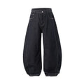 Men's original cow colour wide leg denim trousers laid flat, showing mid waist and straight leg cut.