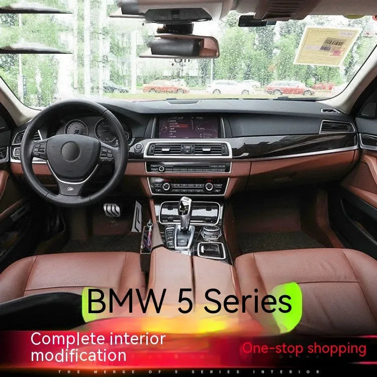 Four silver-finished interior handle decorative frames for BMW 5 Series F10 F11 models on a dark background.