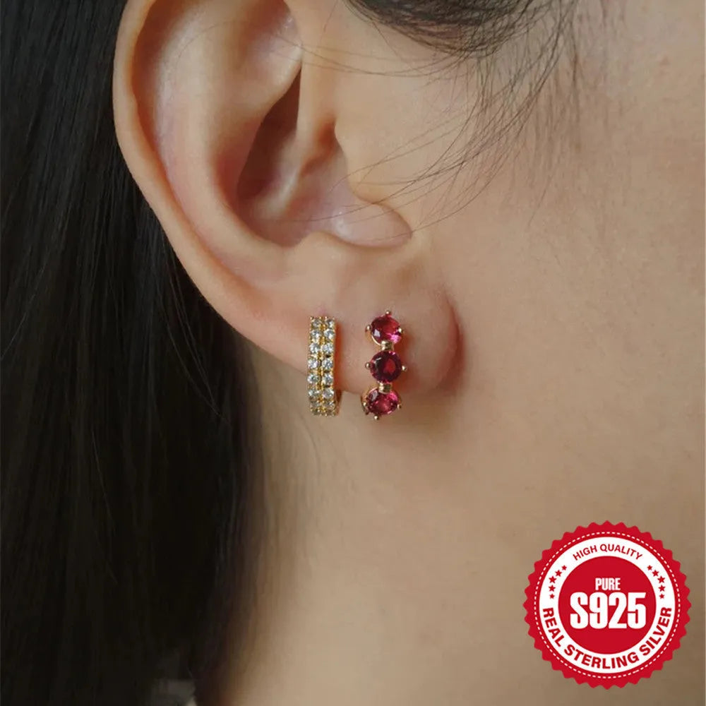 Golden geometric sunflower earrings made from sterling silver with inlaid zircon stones.