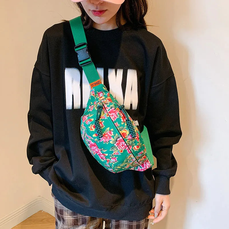 Women's western style waist bag with floral embroidery in black, red, green or blue colours