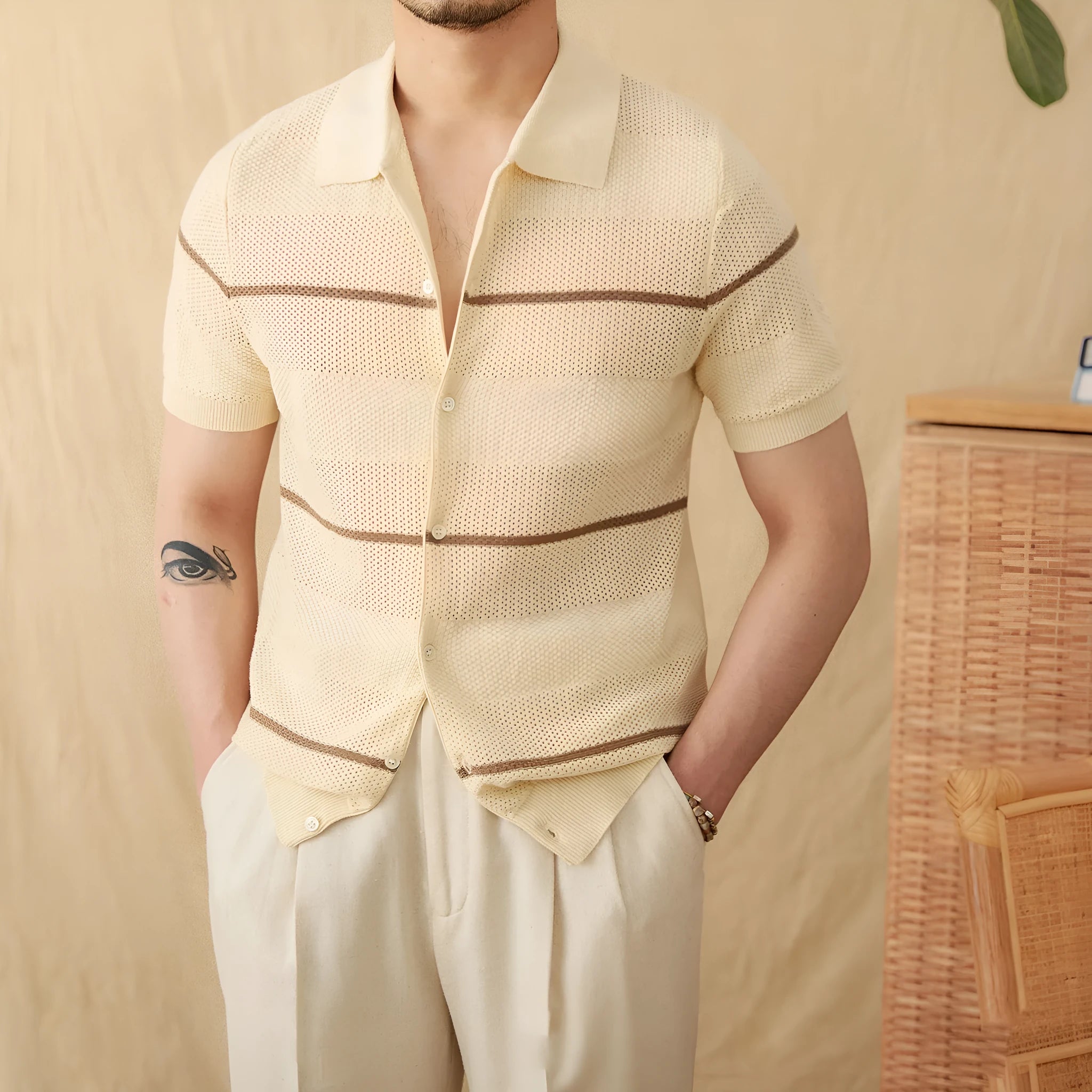 Man's camel coloured lapel cardigan with short sleeves, made from a cotton and linen blend fabric.