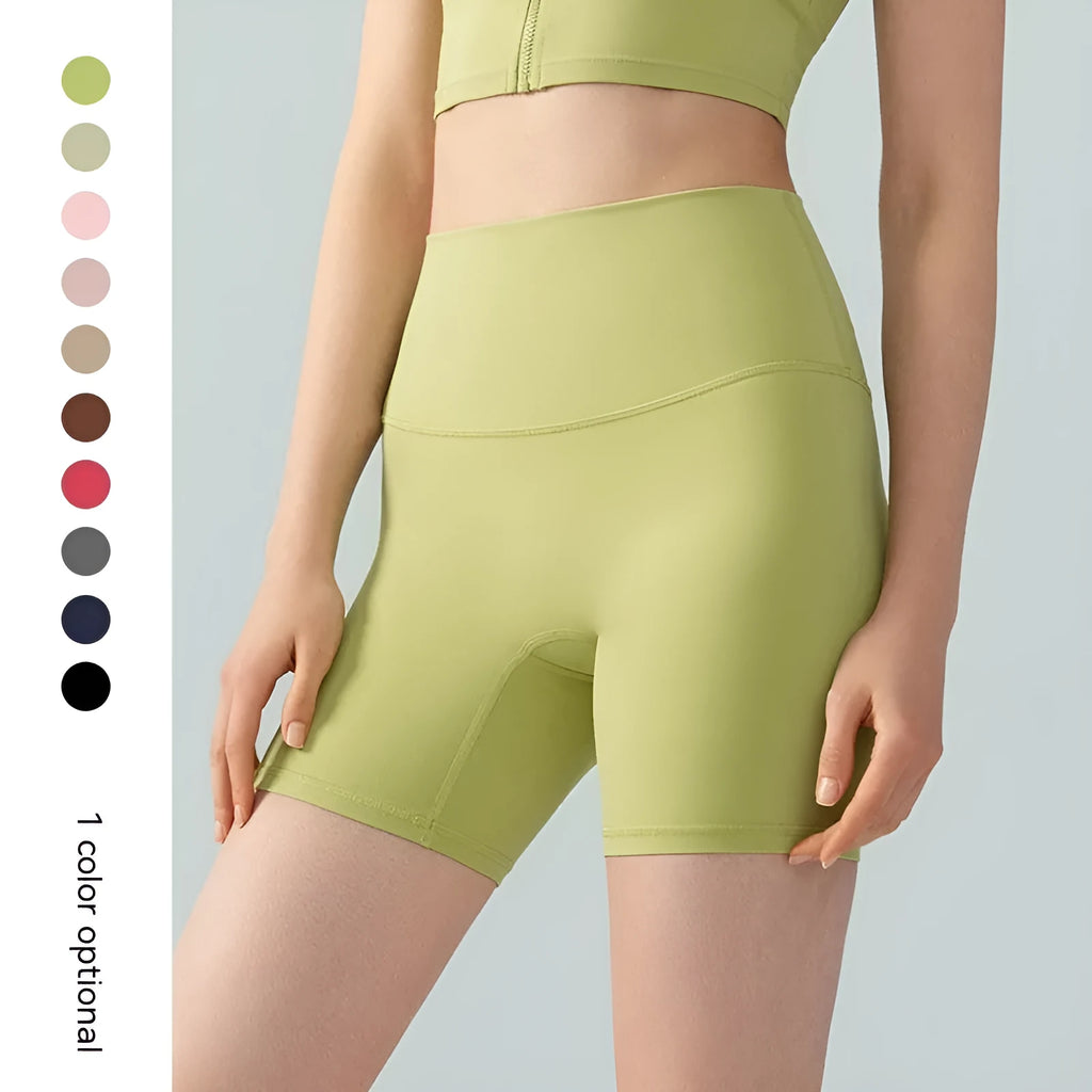 Women's high waist Lycra yoga shorts in leaf green colour with elastic band and short length design