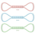 Set of three silicone mini resistance bands in light blue, purple, and pink on a white background