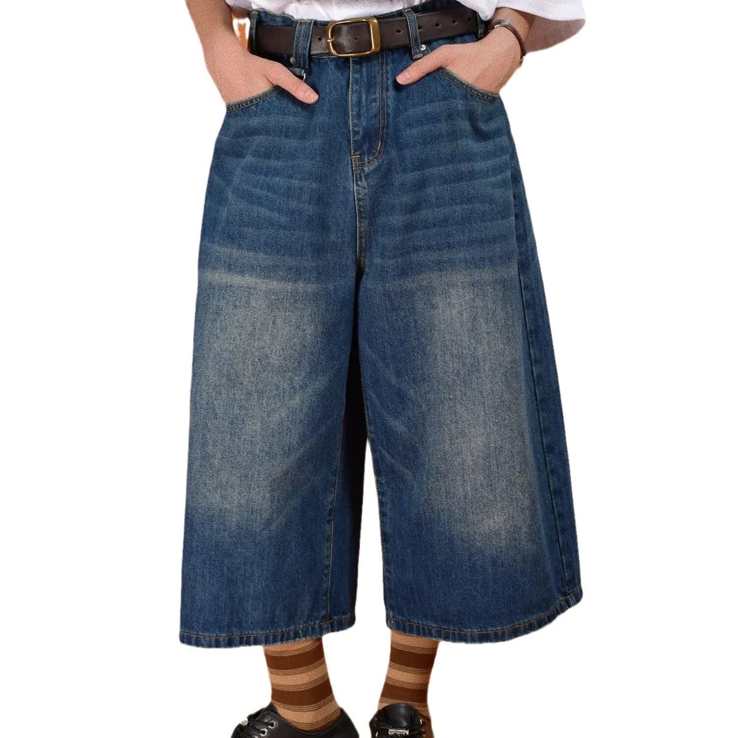 A pair of men's light blue denim shorts with a loose straight-leg cut on a neutral background.