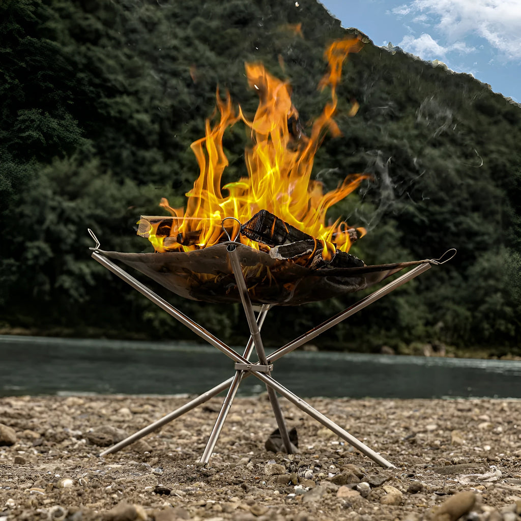 Large stainless steel barbecue with integrated silver grill net for outdoor cooking