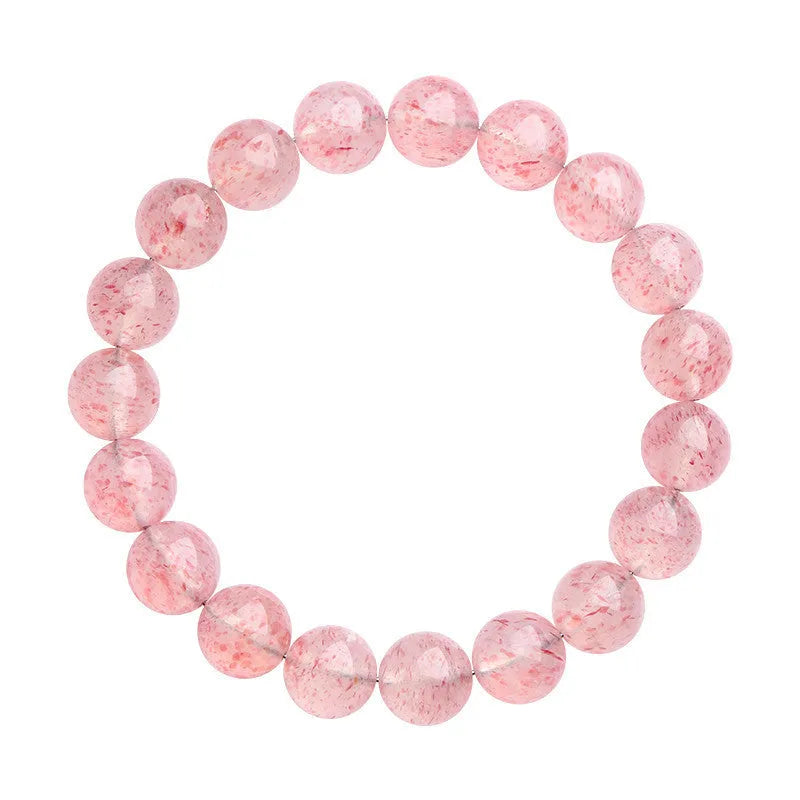 Natural white water strawberry quartz bracelet with 10-10.8mm geometric beads on a wrist.