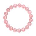 Natural white water strawberry quartz bracelet with 10-10.8mm geometric beads on a wrist.