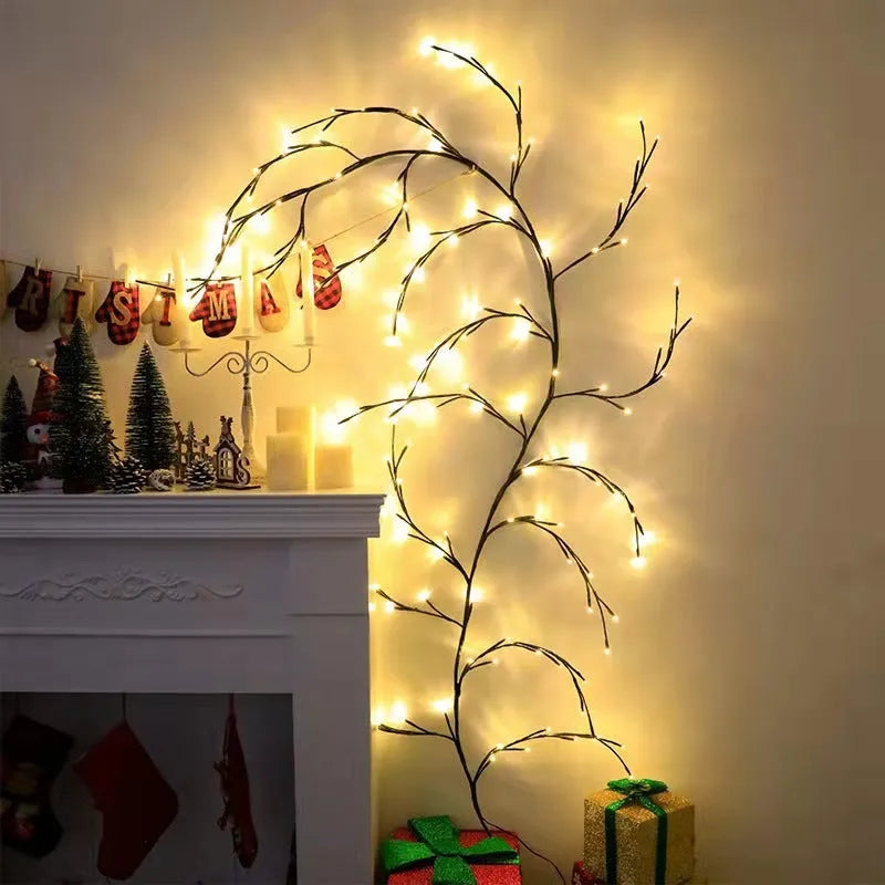 Flexible plastic willow vine LED garland light with warm white lights, shaped on a wall.