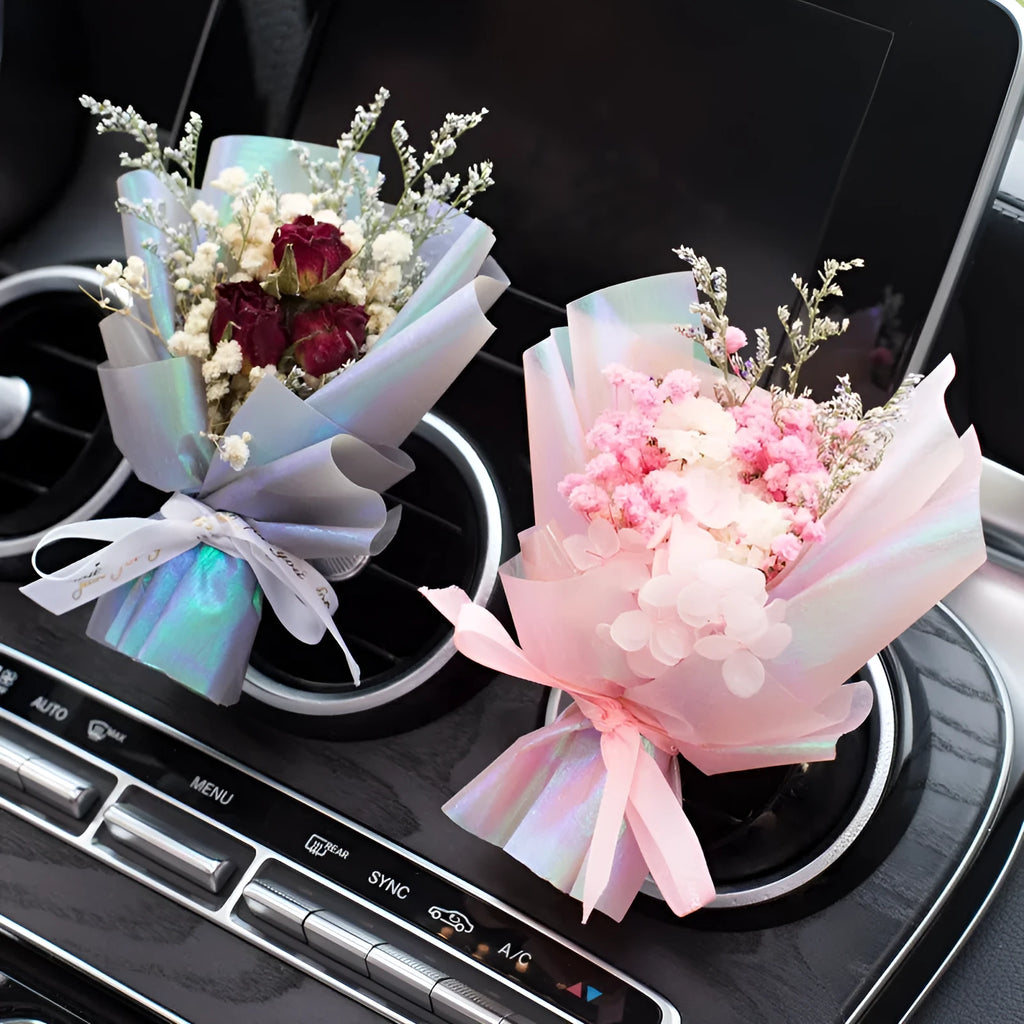 Car vent clip aromatherapy diffuser with dried flower bouquet in multiple colour options.