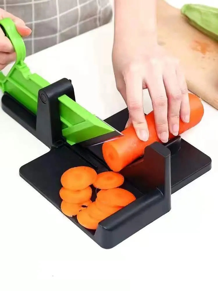 Green and red vegetable cutter with stainless steel blades for cutting carrots and potatoes