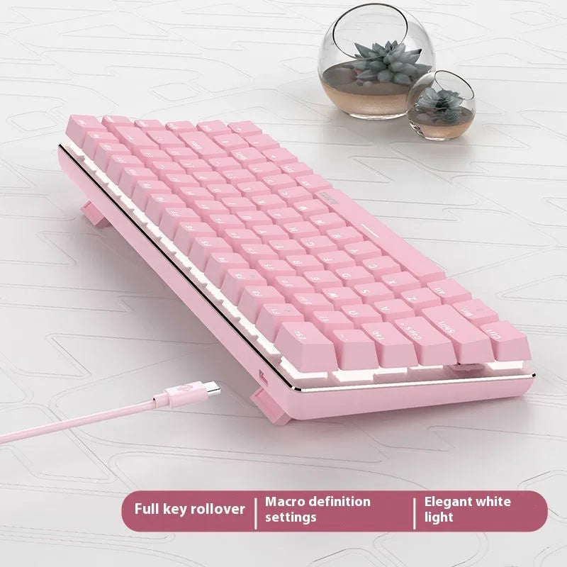 White backlit 82-key metal mechanical gaming keyboard with pink switches for laptops.