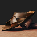 Men's black casual slip-on sandals with a genuine pigskin leather upper and rubber sole