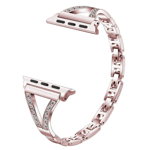 Silver herringbone diamond pattern metal band for Apple Watch on a wrist, showing adjustable links.