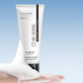 White packaged whitening and freckle removing facial cleanser bottle with 100ml content