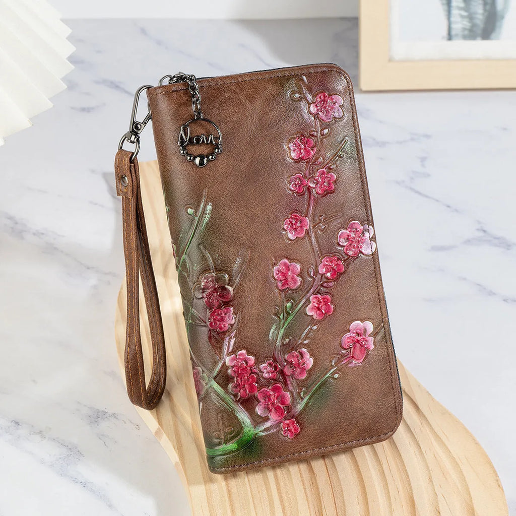 Chinese style embossed floral pattern handbag with hand-painted details in black, brown, and coffee colours