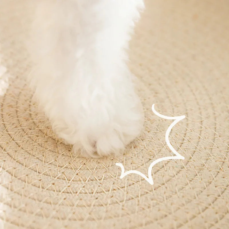 Green oval cat scratching pad and bed made from sisal material