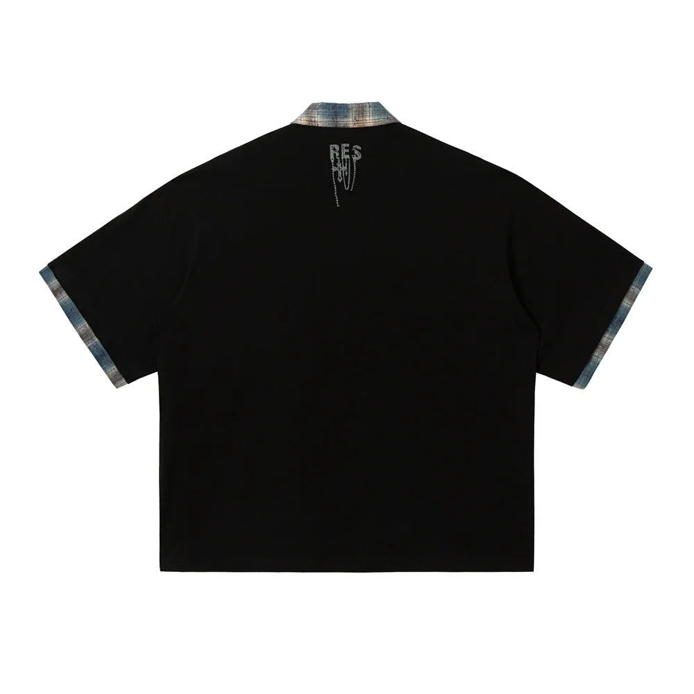 Men's loose asymmetric short-sleeved top with graffiti print on lapel in blue or red.