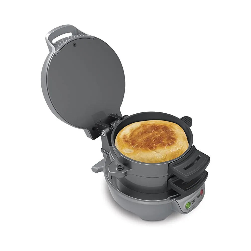 Bright red breakfast machine with sandwich maker and egg cooker ring on kitchen counter