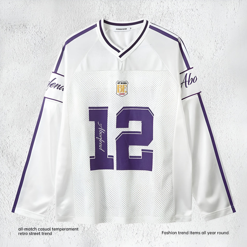 Digital printed long-sleeved V-neck t-shirt in polyester jersey fabric, loose fit with contrast colour detailing