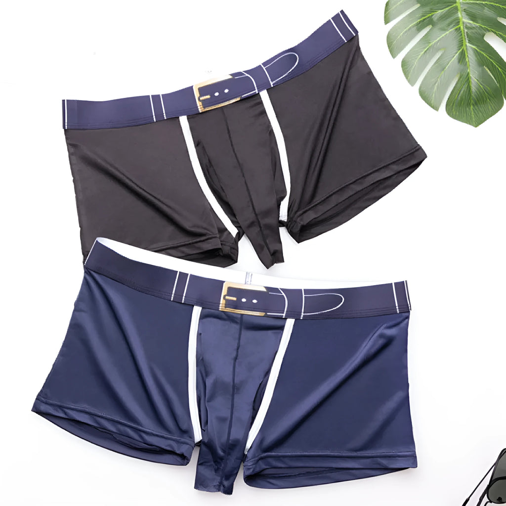 Men's solid colour ice silk boxer briefs on a mid waist model, showing the gray, black, blue, and green colour options.
