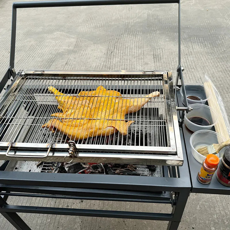Large foldable and detachable charcoal BBQ grill oven stove for outdoor cooking.