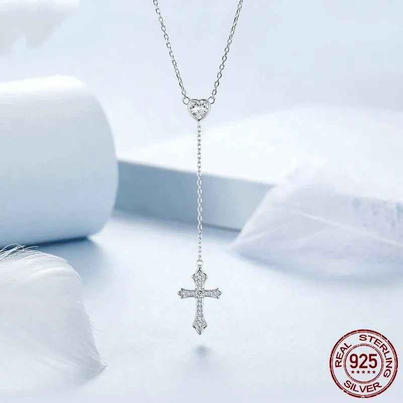 Simple V-neck love cross pendant on a silver O-link chain