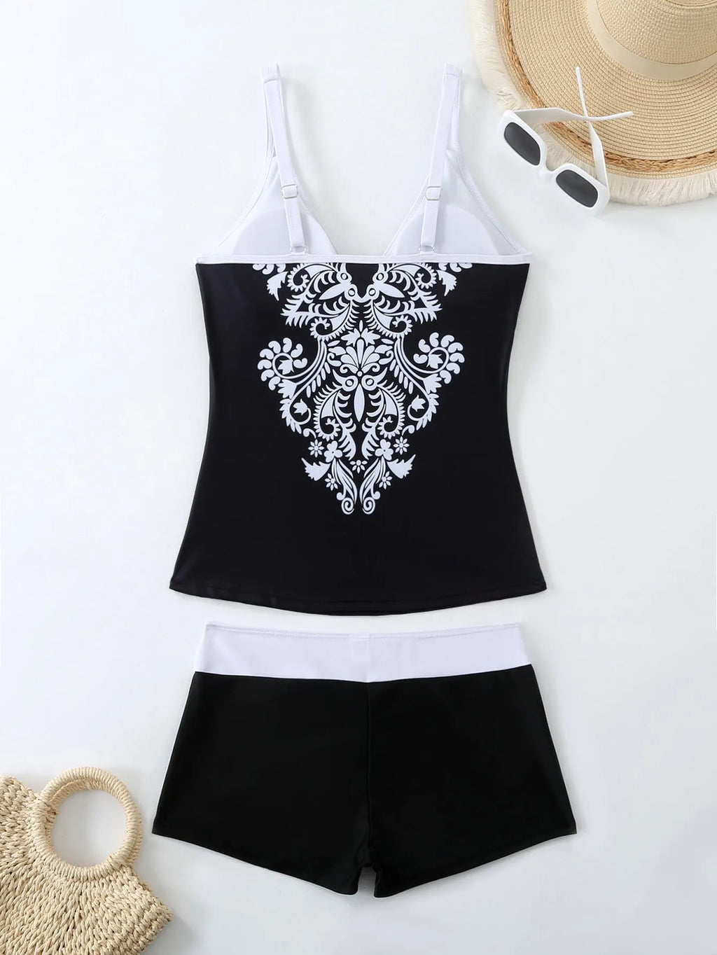Plus size women's two-piece printed swimsuit in black or rose red with a cotton lining.