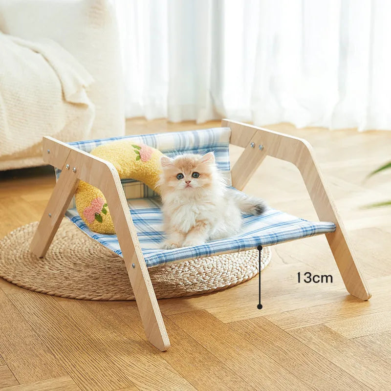 Wooden elevated cat bed with beach chair design and soft cloth hammock in blue colour