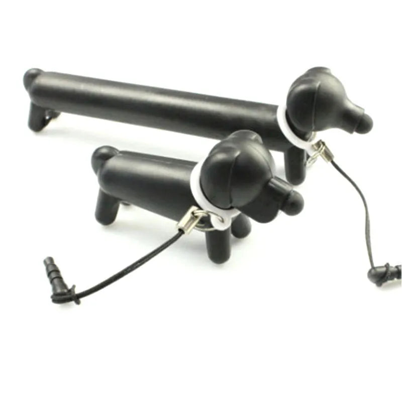 Black dog-shaped touch screen stylus with phone stand function on a white background