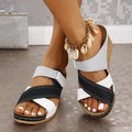 Women's black and red platform wedge slippers with velcro straps and a fish mouth open toe.
