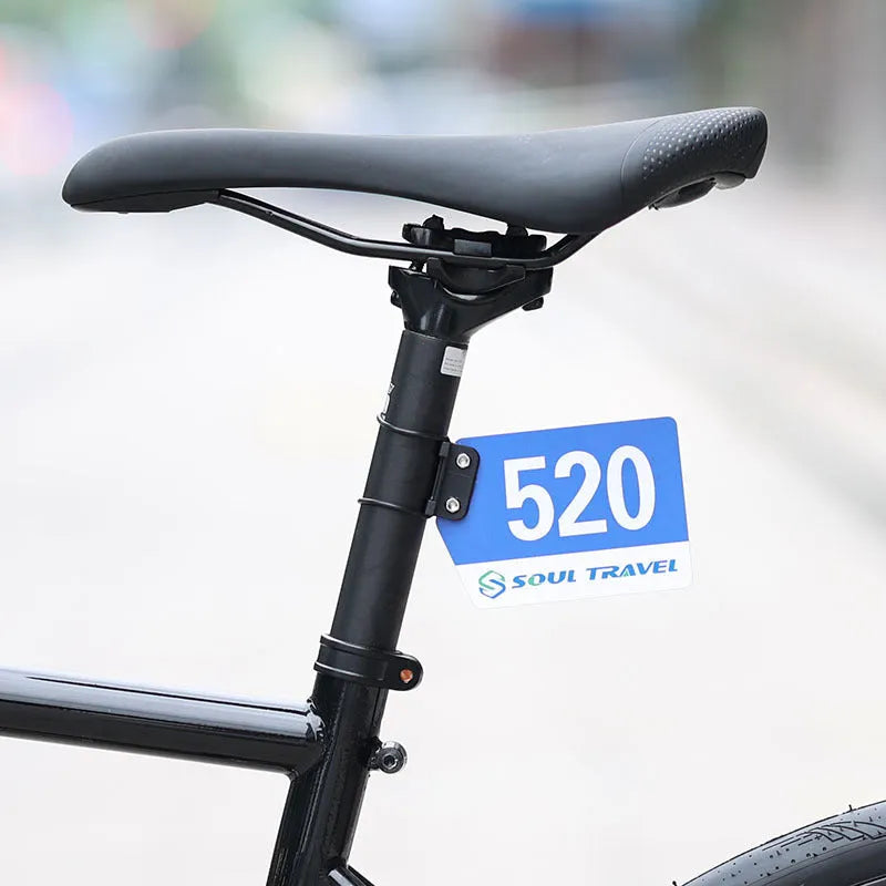 Bicycle competition number plate bracket with leather rings and tool for round tube or cracked duct mounting