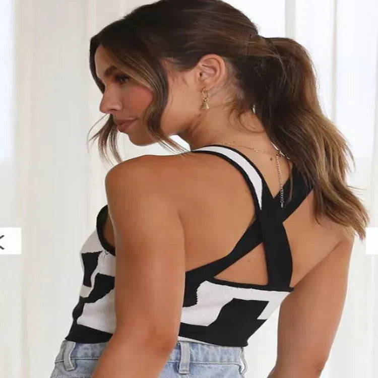Women's slim fit camisole vest with U collar and exposed navel design in stretch polyester fabric.
