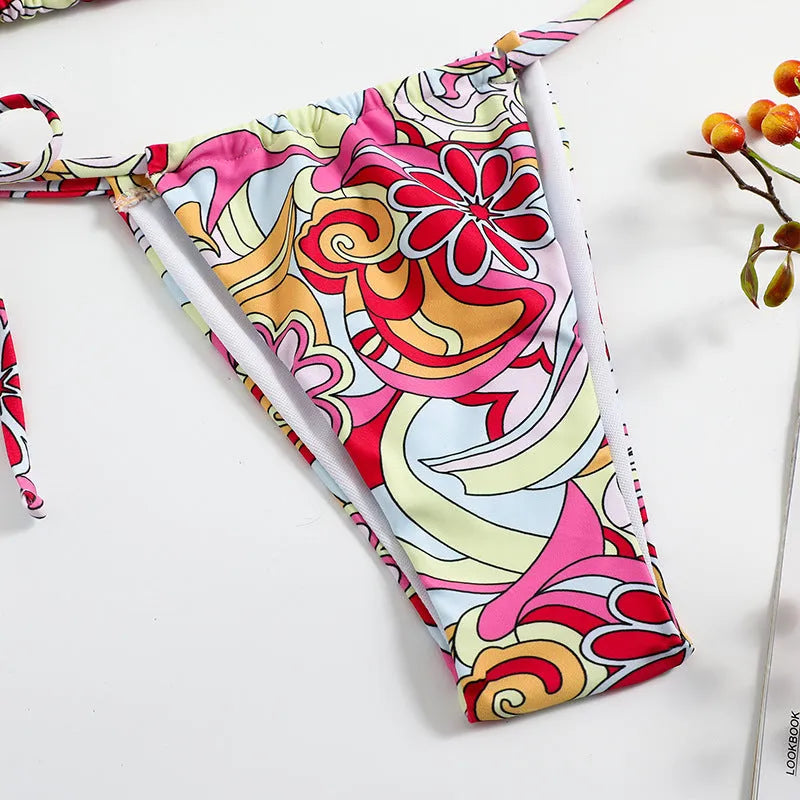 Women's multicolour triangle print bikini with hanging neck design and separate bottoms