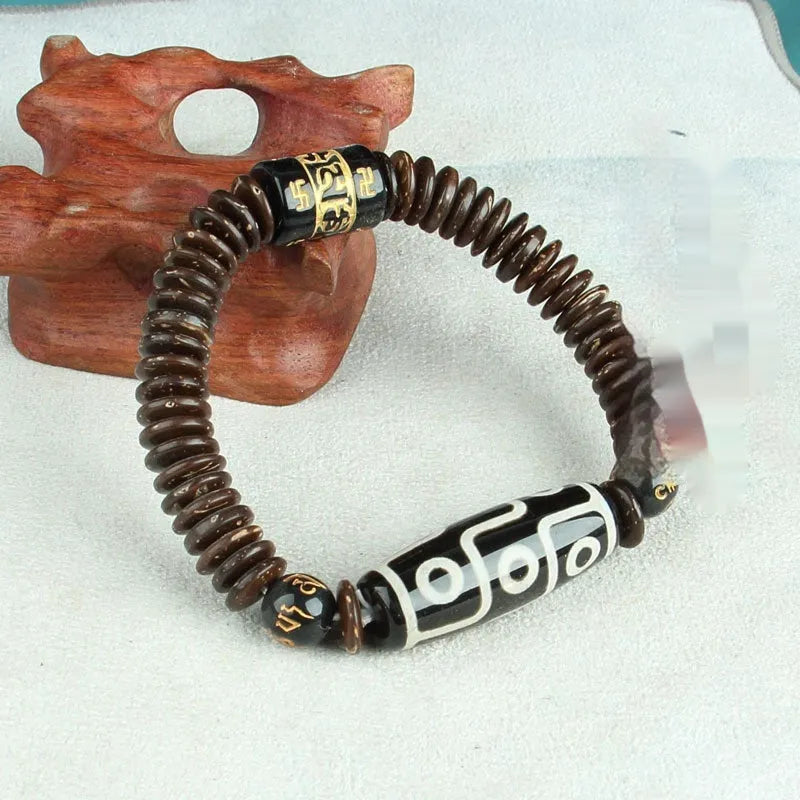 Distressed agate Tibet beads bracelet with three eye dzi design and polished stone beads