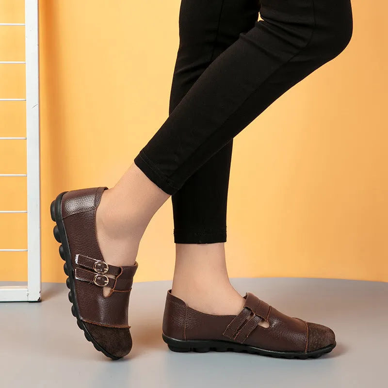 Casual low top flat shoes with Velcro strap in cow split leather, available in multiple colours.