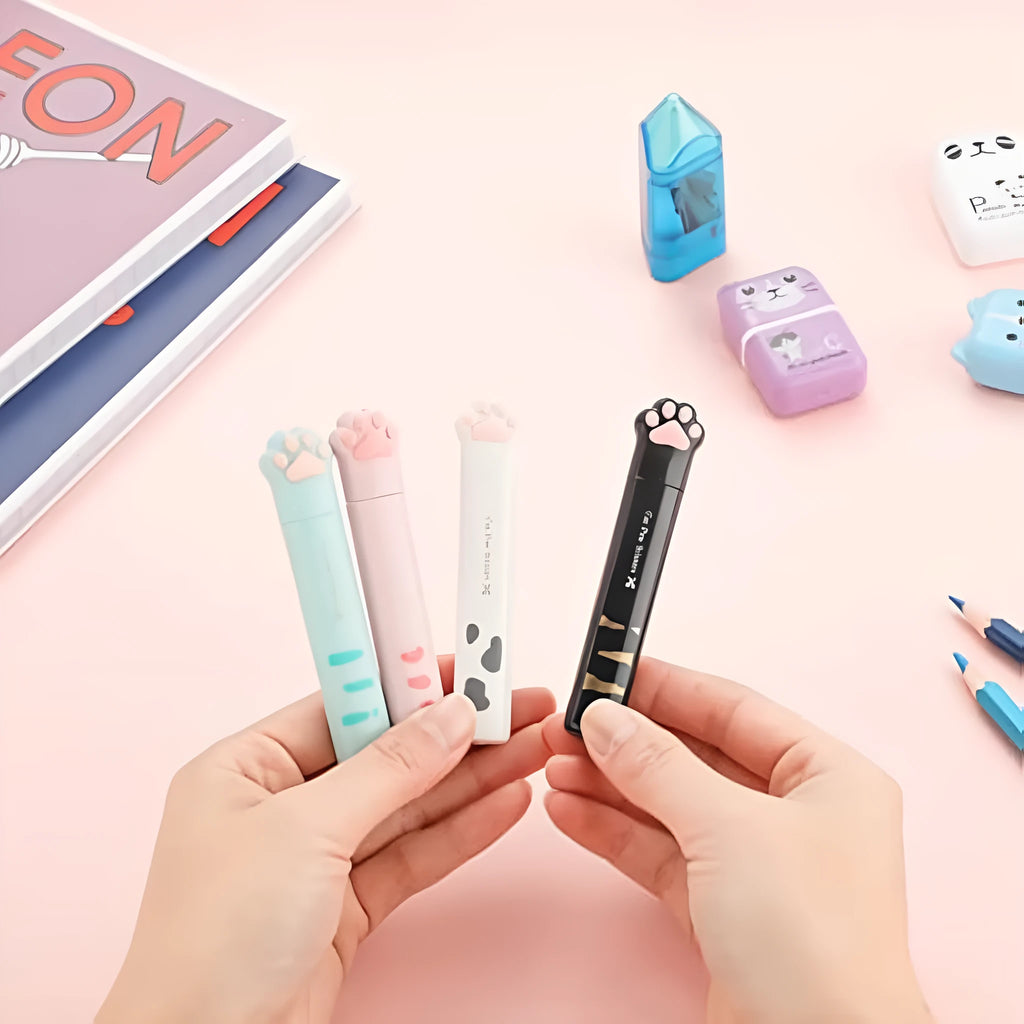 Cat paw design mini folding scissors with stainless steel blades shown open and closed