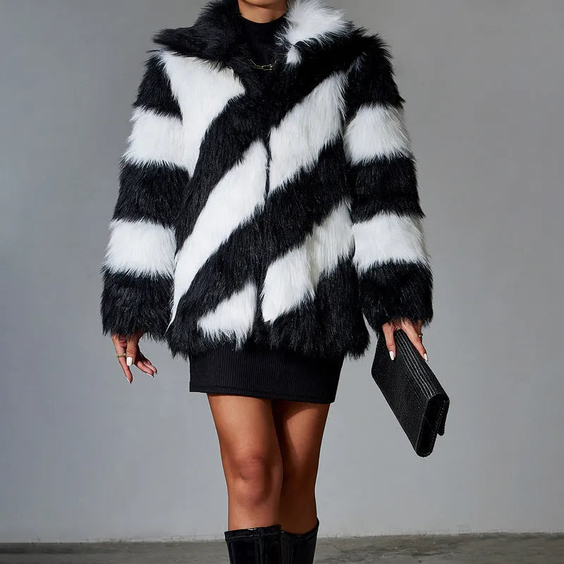 Women's faux fur coat with contrasting lapels and a full fur collar in a regular fit.