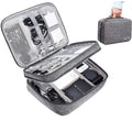 Grey waterproof double-layer travel cable organizer bag with portable handle and multiple pockets