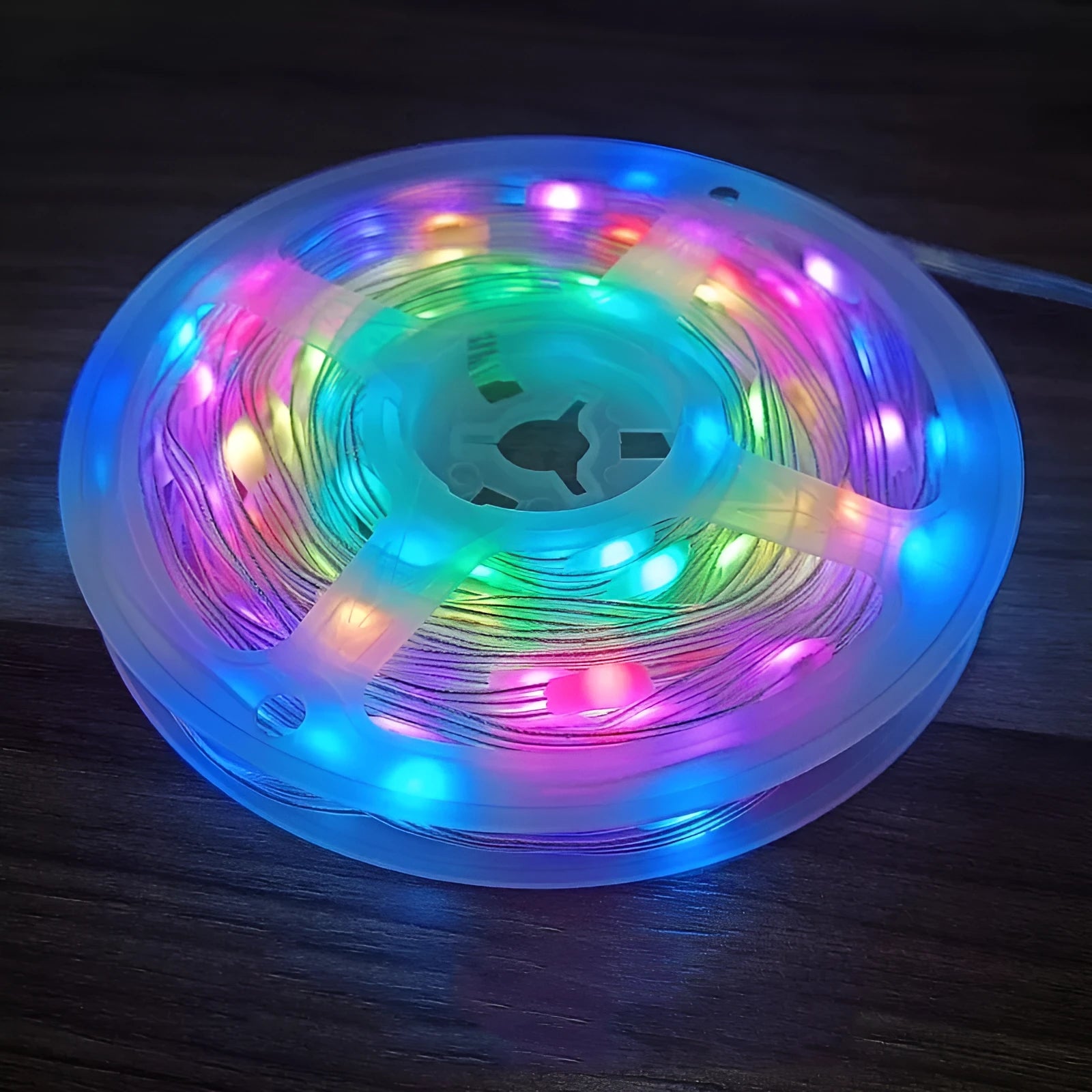 10 metre long LED light string with 100 multi-colour bulbs draped in decorative pattern