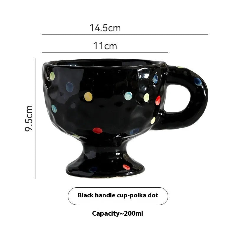 Hand-pinched irregular ceramic mug in solid colour with modern design and 14.5cm height