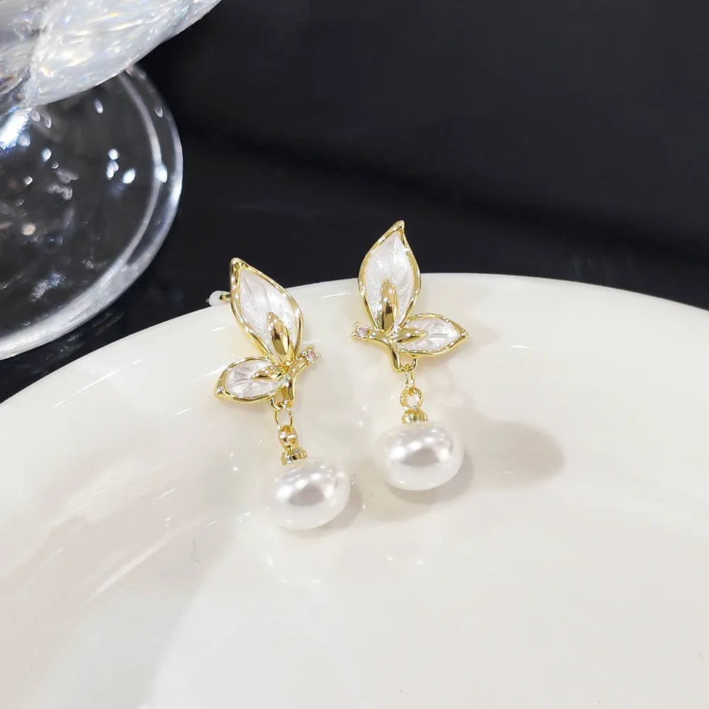Copper butterfly earrings for women with electroplated finish and zircon painting details