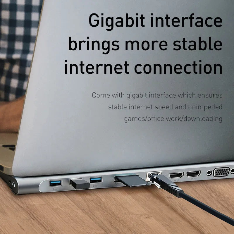 Grey aluminium ten-port USB C docking hub with cooling bracket, showing HDMI, VGA, Ethernet, and USB ports.