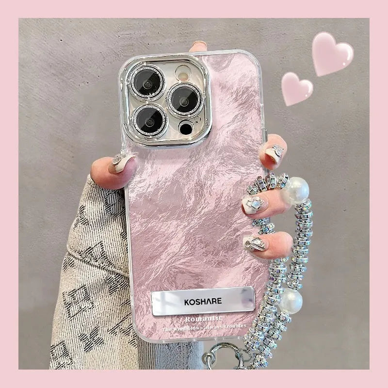 Ice blue gradient hard PC phone case with invisible bracket and silver chain for iPhone set on a white surface