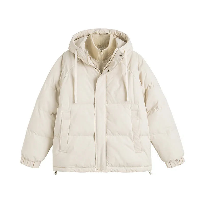 Loose fit winter coat in polyester with side seam pockets available in six solid colours